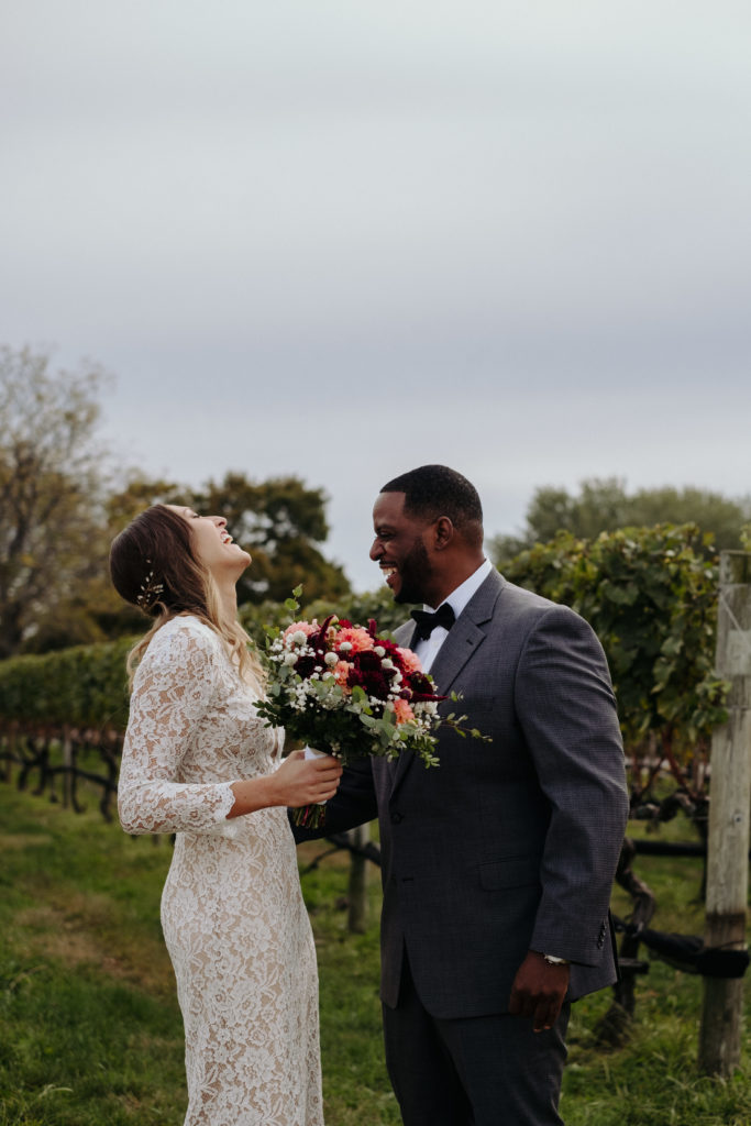 Bride in BHLDN dress with groom at Pellegrini Vineyards Long Island