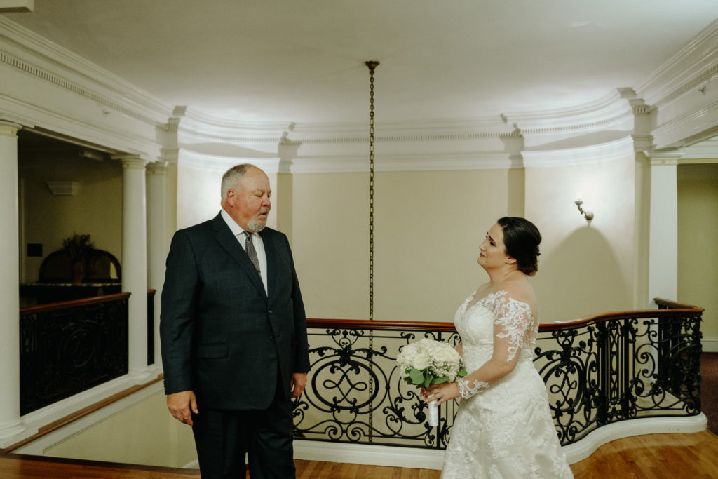 Bride has first look with Father of the Bride at Tupper Manor Wedding