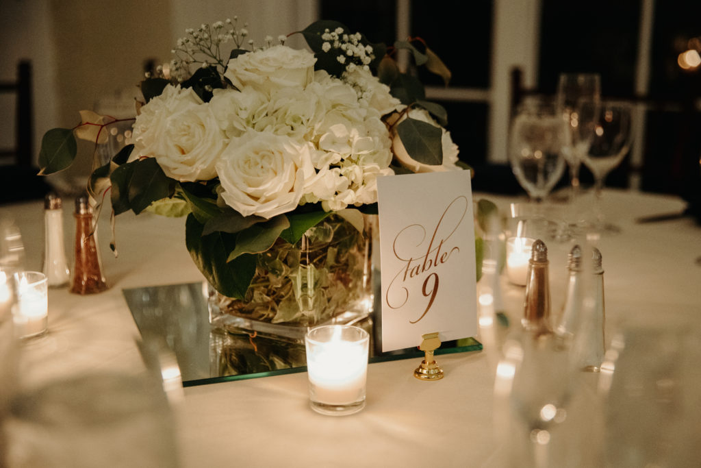 Candlelit table settings for reception at Tupper Manor Wedding