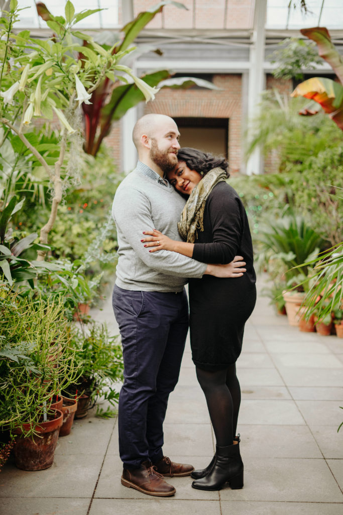Couple pose together in Limonaia during Tower Hill Botanic Garden Engagement Session