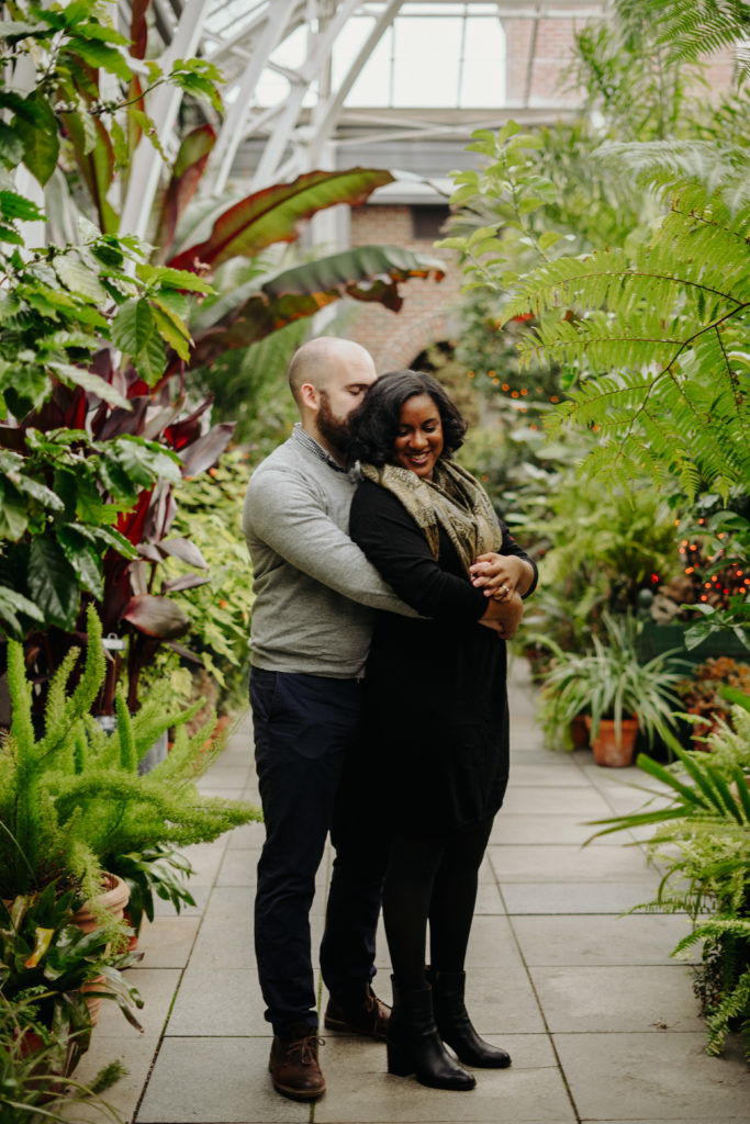 Couple pose together in Limonaia during Tower Hill Botanic Garden Engagement Session
