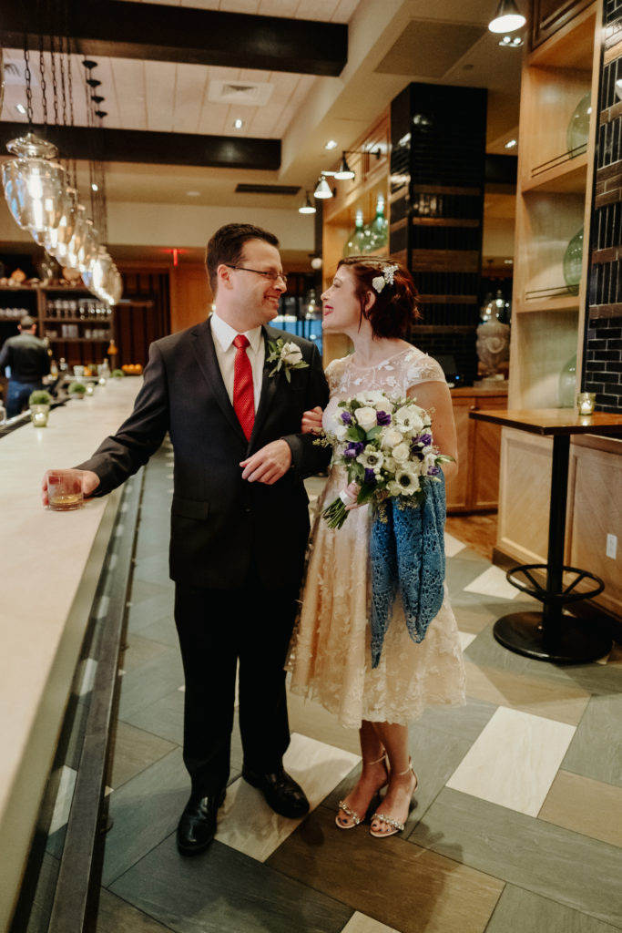 Bride and Groom first look at the bar at Osteria Posto, Boston Wedding Photographer