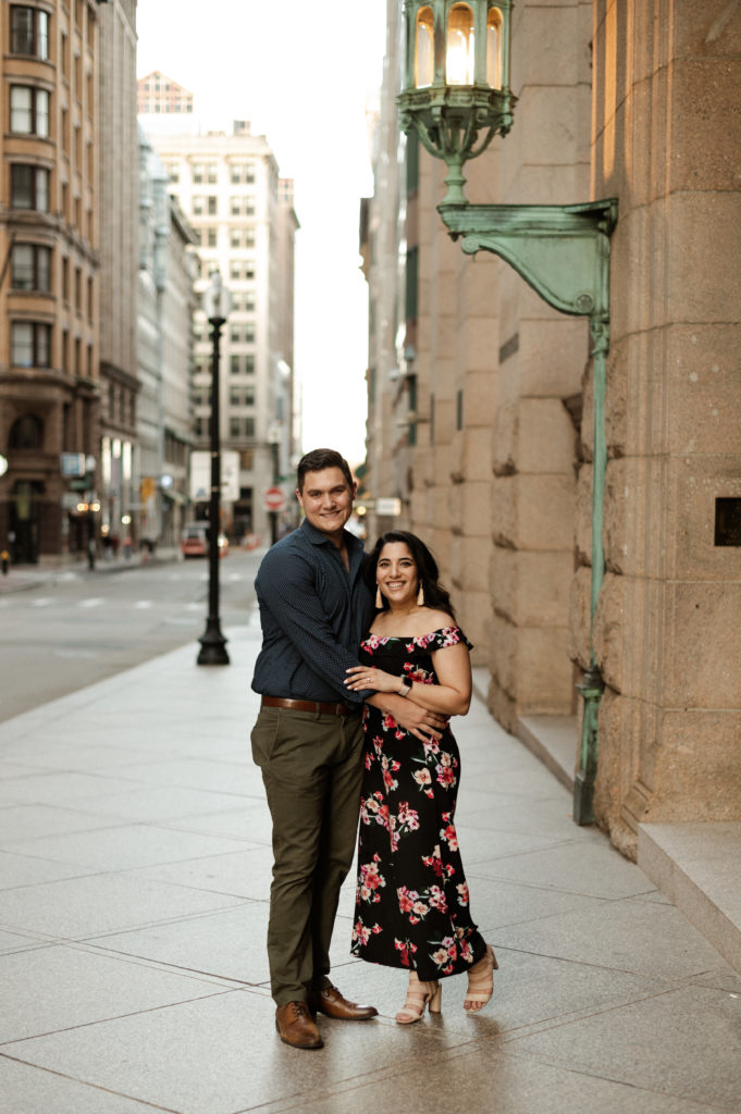 Newly Engaged Couple walk through streets of Boston