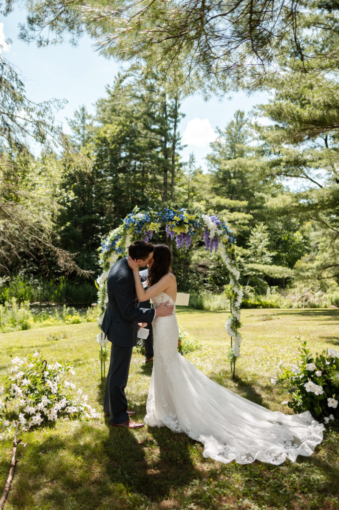 Bride and groom kiss during ceremony at Berkshires Microwedding in Upstate New York