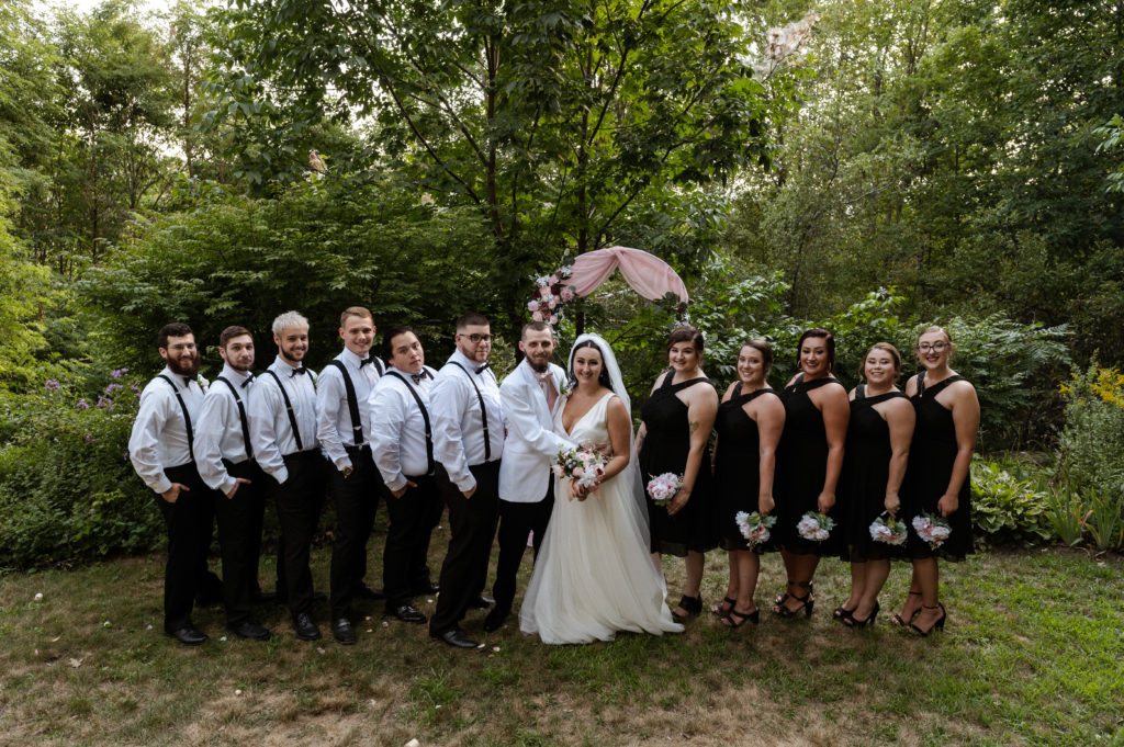Entire bridal party poses with Bride and Groom at New Hampshire White Mountains Microwedding