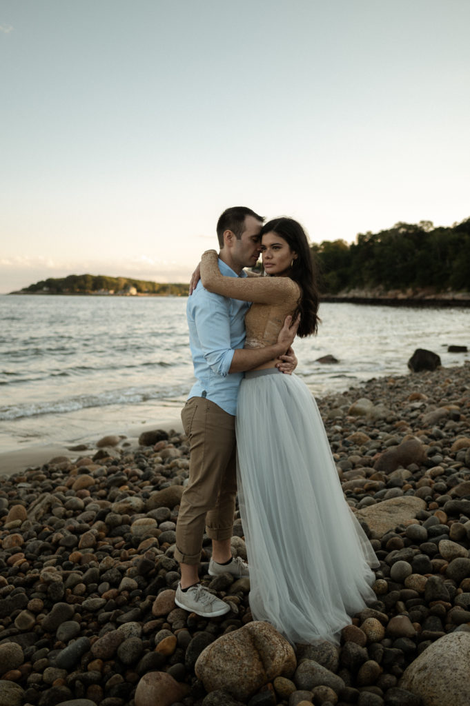 Sunset engagement session in Gloucester Massachusetts at Half Moon Beach