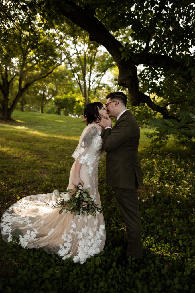 Bride and groom portraits in Boston's Arnold Arboretum with stylish boho vintage elopement