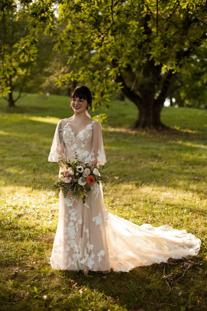 Bride wearing BHLDN wedding gown during golden hour portraits in Boston Arnold Arboretum Elopement
