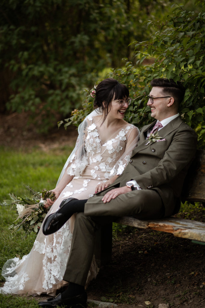 Bride and groom portraits in Boston's Arnold Arboretum with stylish boho vintage elopement