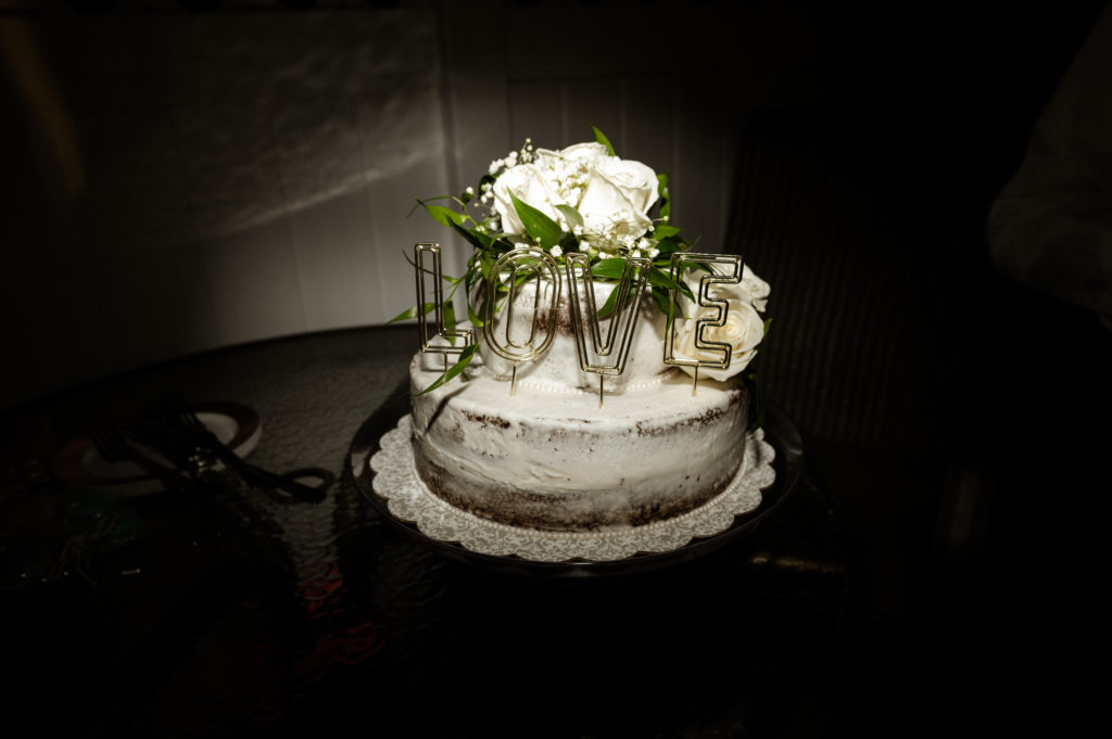 Semi Naked White Wedding Cake with Love cake topper