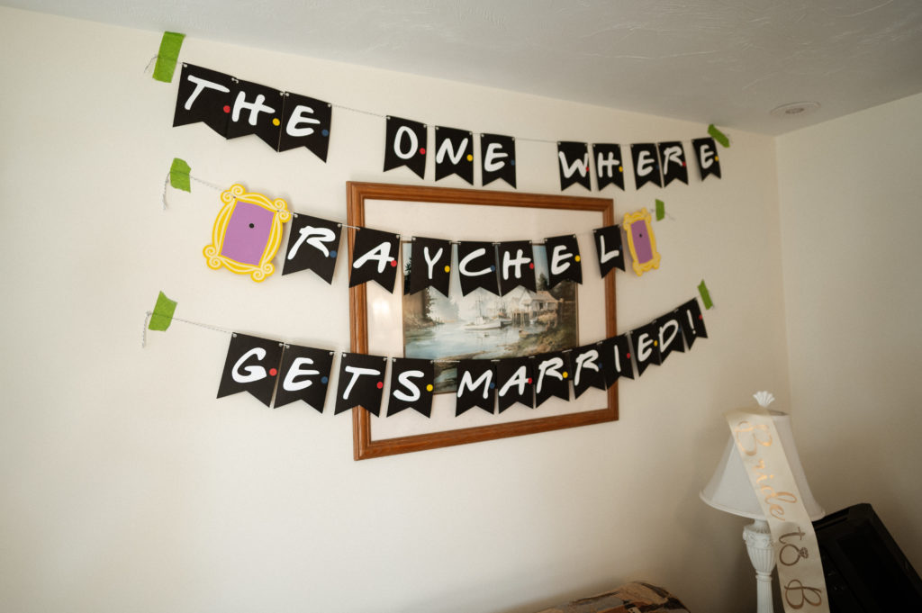 Friends themed sign for bride getting ready at The Lighthouse Inn Cape Cod wedding