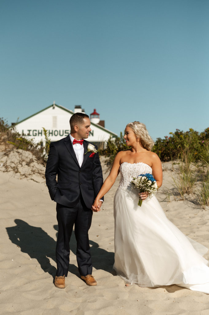 Bride and groom beach wedding portraits in West Dennis Massachusetts at the Lighthouse Inn on Cape Cod