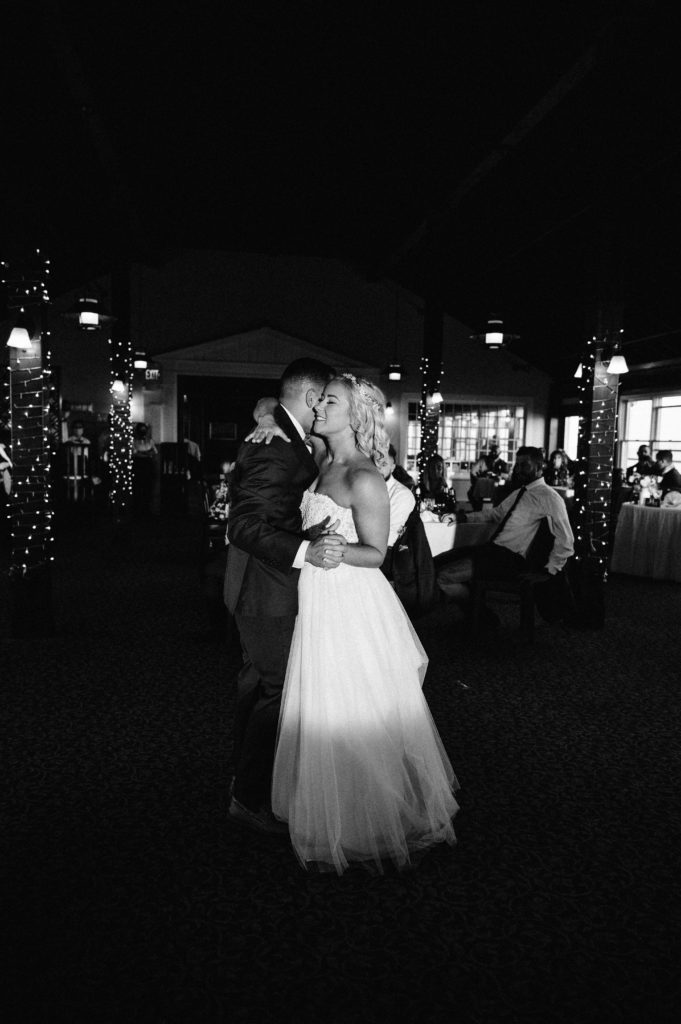 Black and white photo of bride and groom first dance at the Lighthouse Inn Cape Cod