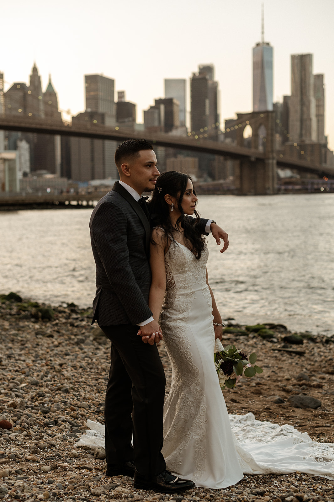 Bride and groom infront of the Brooklyn Bridge at Sunset in NYC