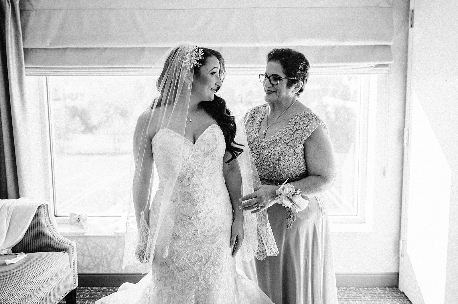 B&W Bride after getting ready with mother