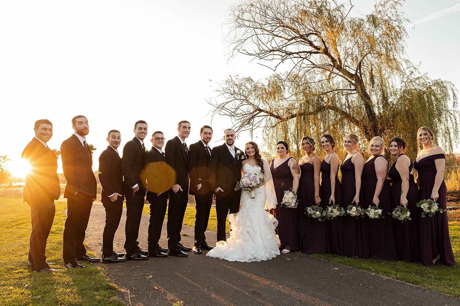 Formal portrait of Bride and Groom with entire wedding party