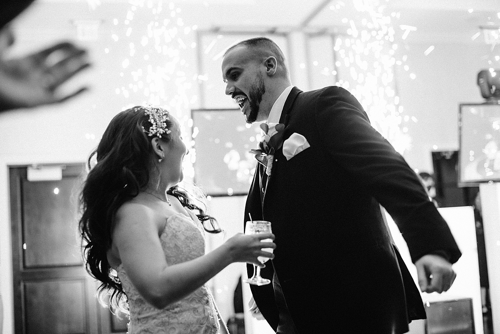 B&W Candid shot of Bride and Groom at Reception