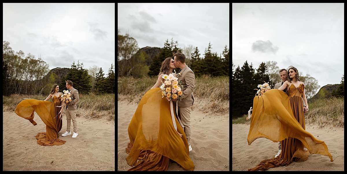 Bride and groom kiss on Sand Beach in Acadia National Park