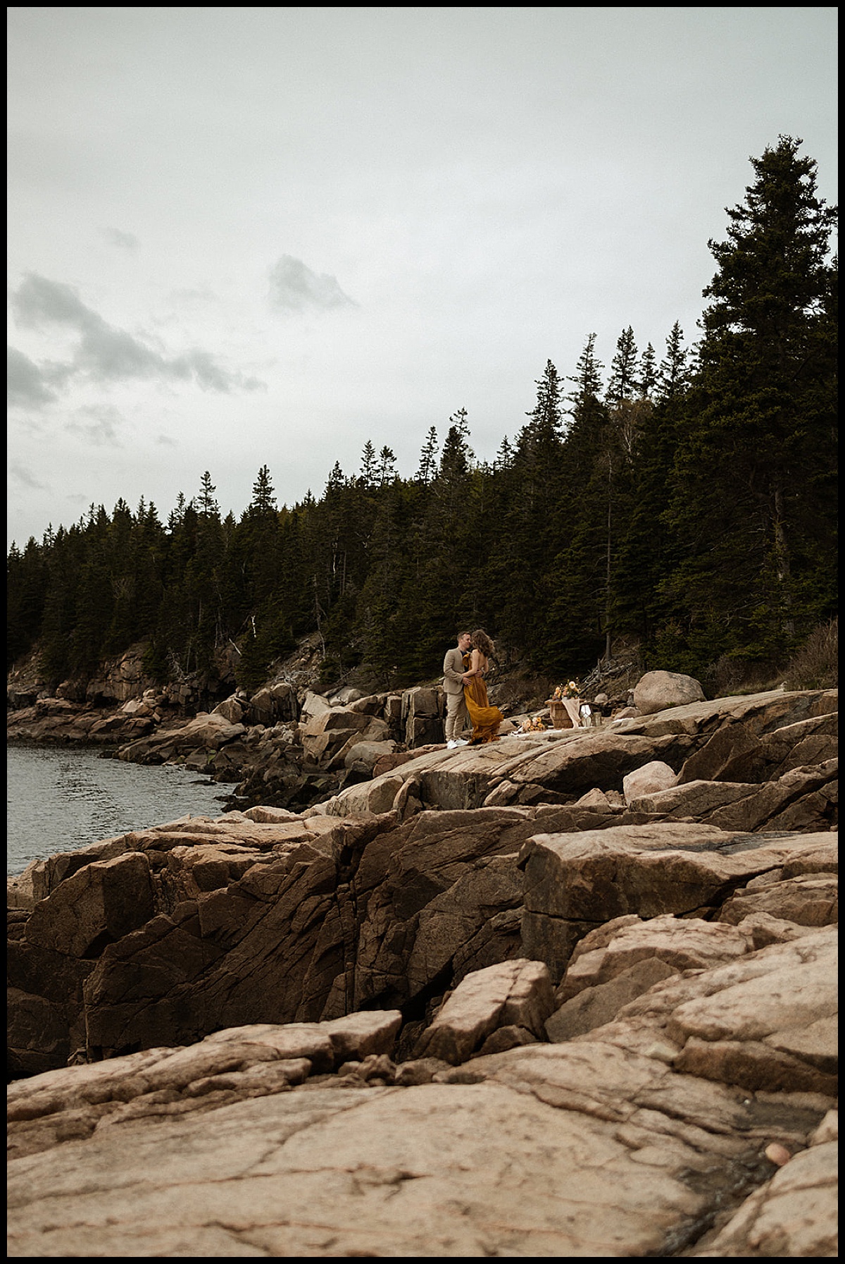 Otter Cliffs in Acadia National Park bride and groom portrait